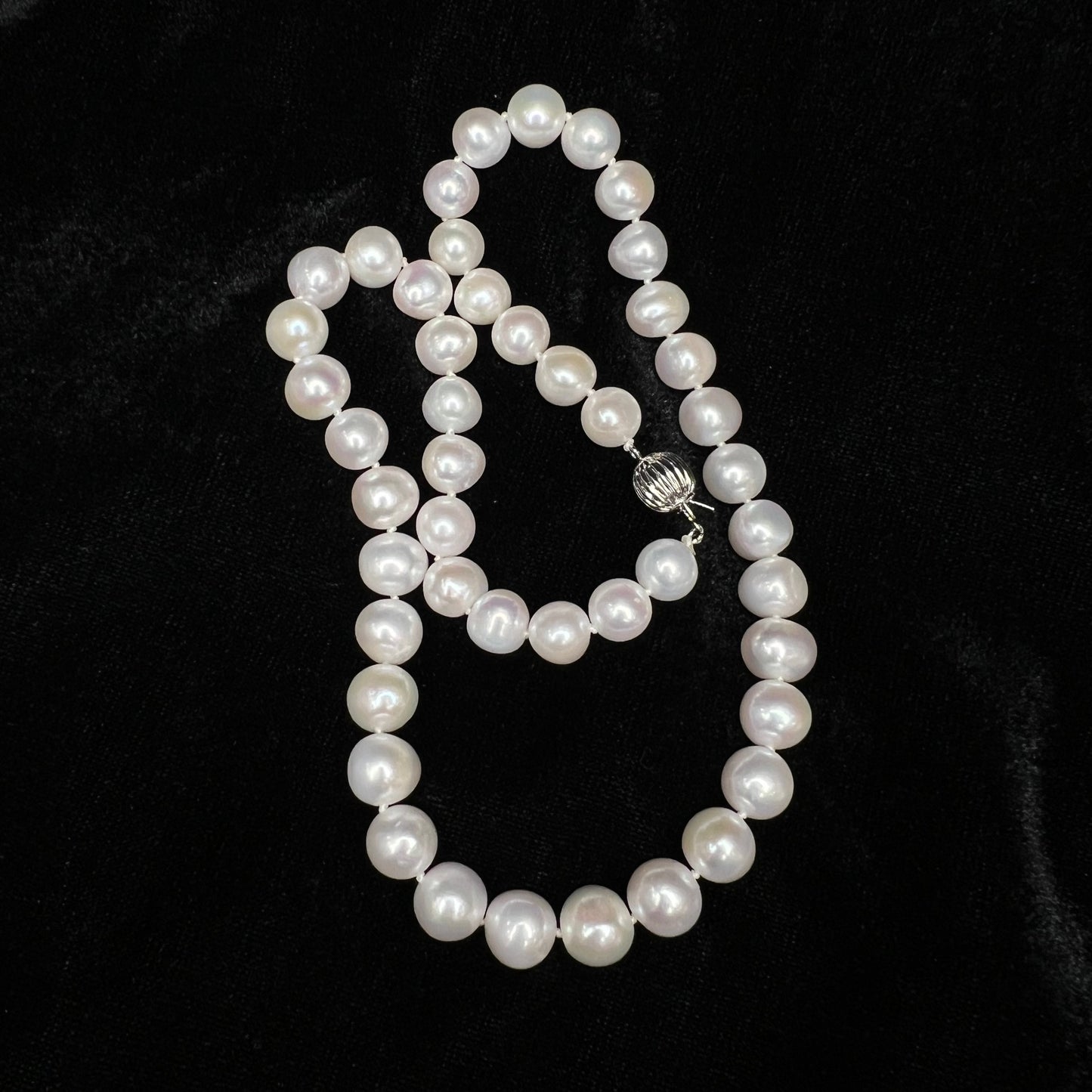 The 9MM natural freshwater pearl necklace from XiGems showcases lustrous, uniform pearls in classic white, ideal for elegant, everyday wear or special occasions.